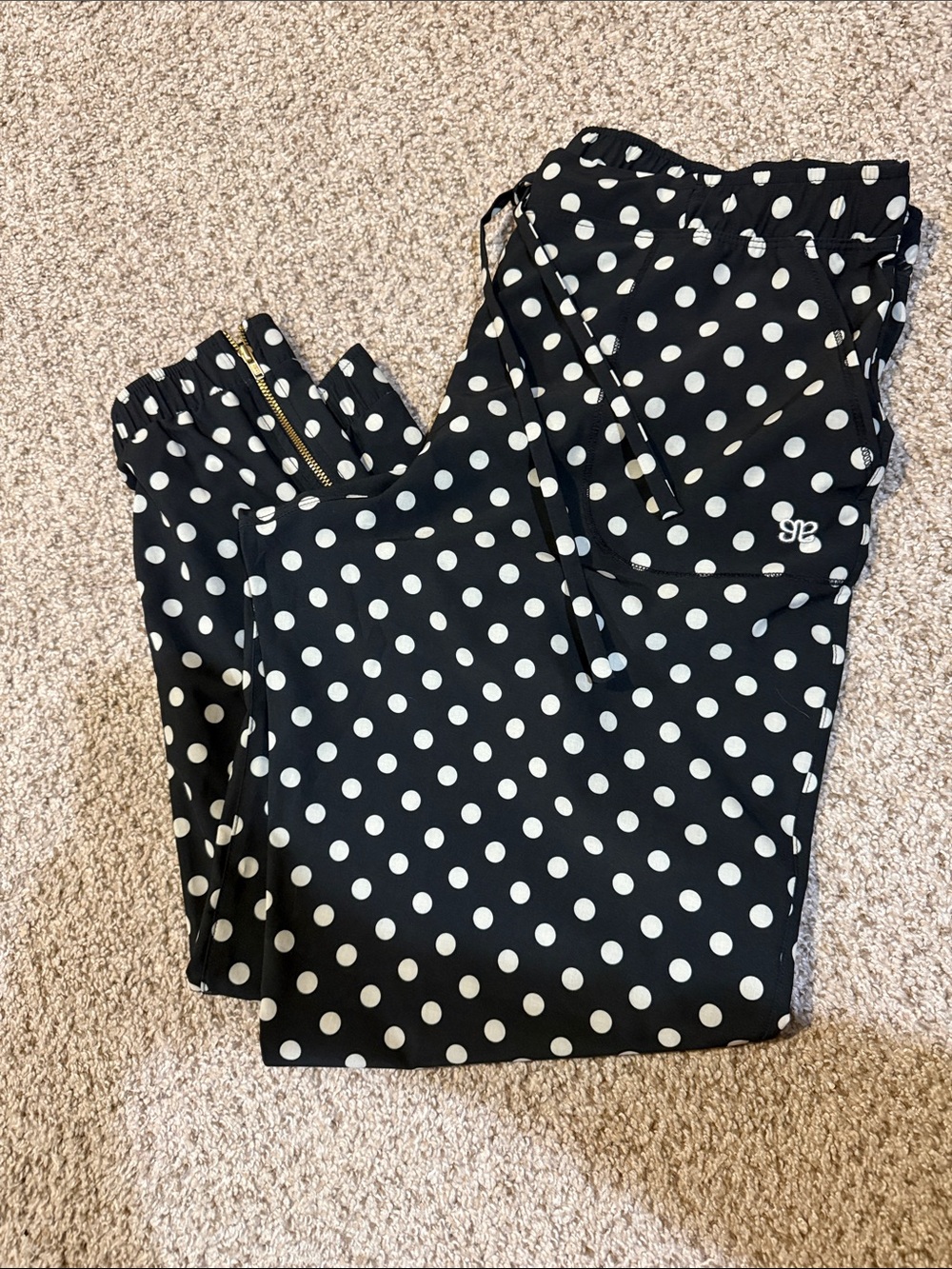 Womens Albion Black and White Polka Dot Jogger Pants with zipper detail